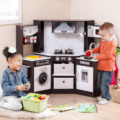 The corner play kitchen with two children playing and a dog sitting in front of it