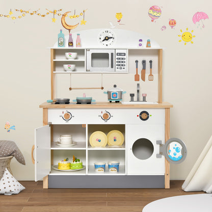 The wooden play kitchen set with microwave and washing machine, with doors open