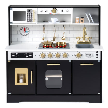 Close up of the black wooden play kitchen with gold accents and accessories