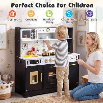 A mother and child interact with the black wooden play kitchen set