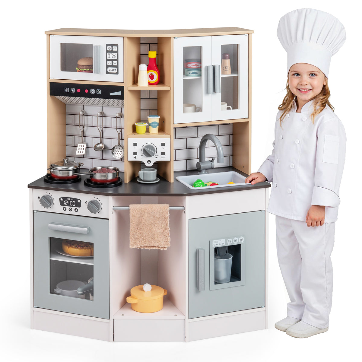 Girl in chef's uniform standing next to the wooden kitchen playset