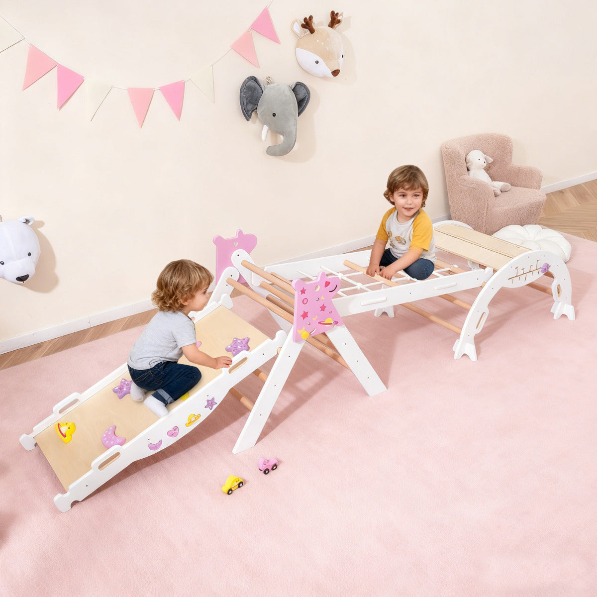 Two toddlers playing on the wooden climbing frame in a nursery room