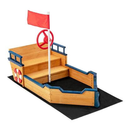 Wooden Pirate Sandboat with Bench Seat and Flag, a wooden sandbox shaped like a boat with a red flag and steering wheel