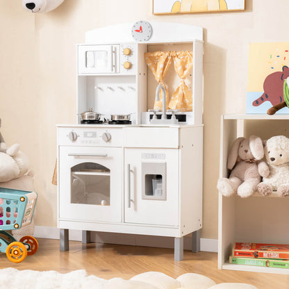 The play kitchen set placed in a nursery next to a shelf with soft toys and a small trolley