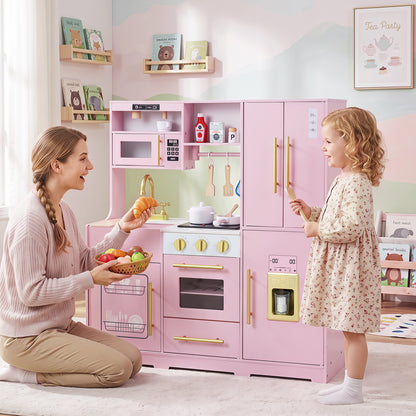 A mother and daughter interact with the pink play kitchen set in a decorated room