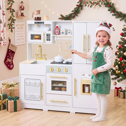 A young girl in a Santa hat plays with the white wooden play kitchen set at Christmas