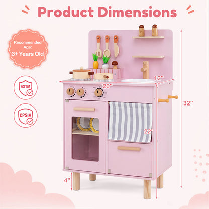 The pink wooden play kitchen shown with its dimensions, including height, width and depth