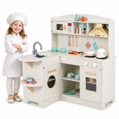 The play kitchen set standing next to a young girl dressed as a chef