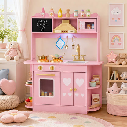 The play kitchen set displayed in a decorated child bedroom with soft toys and a round rug