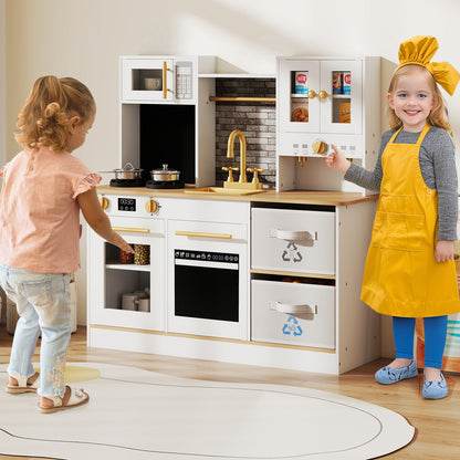 Two children playing with the wooden kitchen set, one at the sink and one at the oven