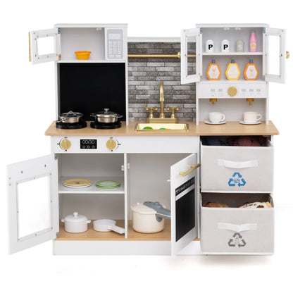 The kitchen set with doors and drawers open, showing internal storage and accessories