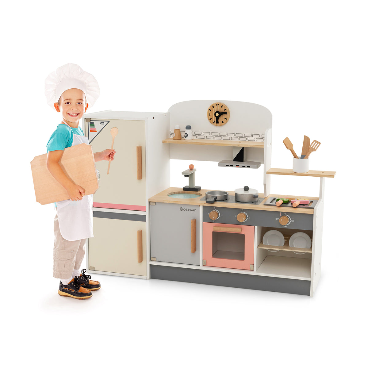 Wooden Pretend Kids Play Kitchen Set with a child standing next to it wearing a chef's hat