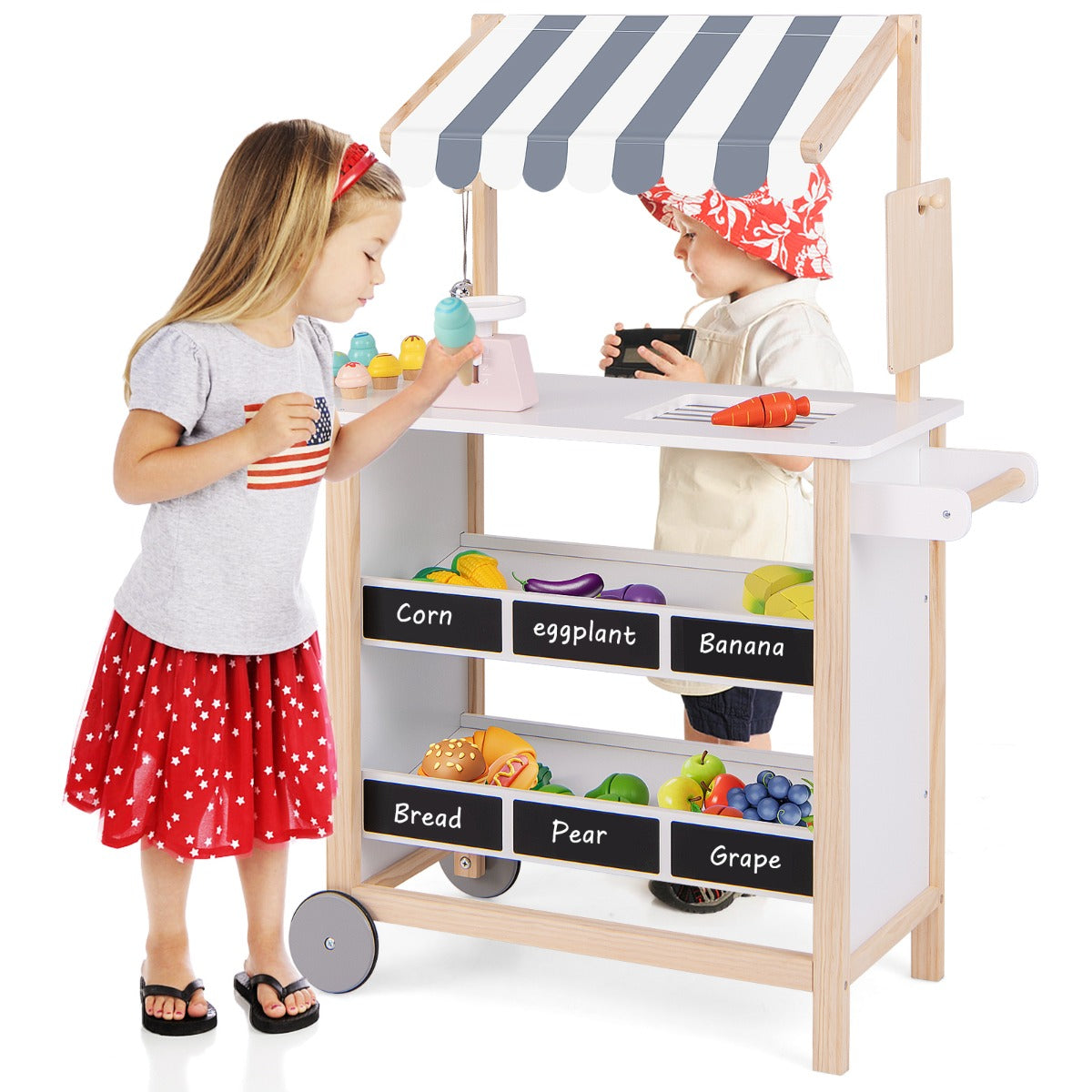 The play kitchen set being used by two children playing together in a bright indoor setting