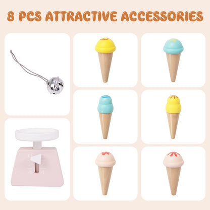 The play kitchen set accessories including a bell, a scale and six toy ice cream cones