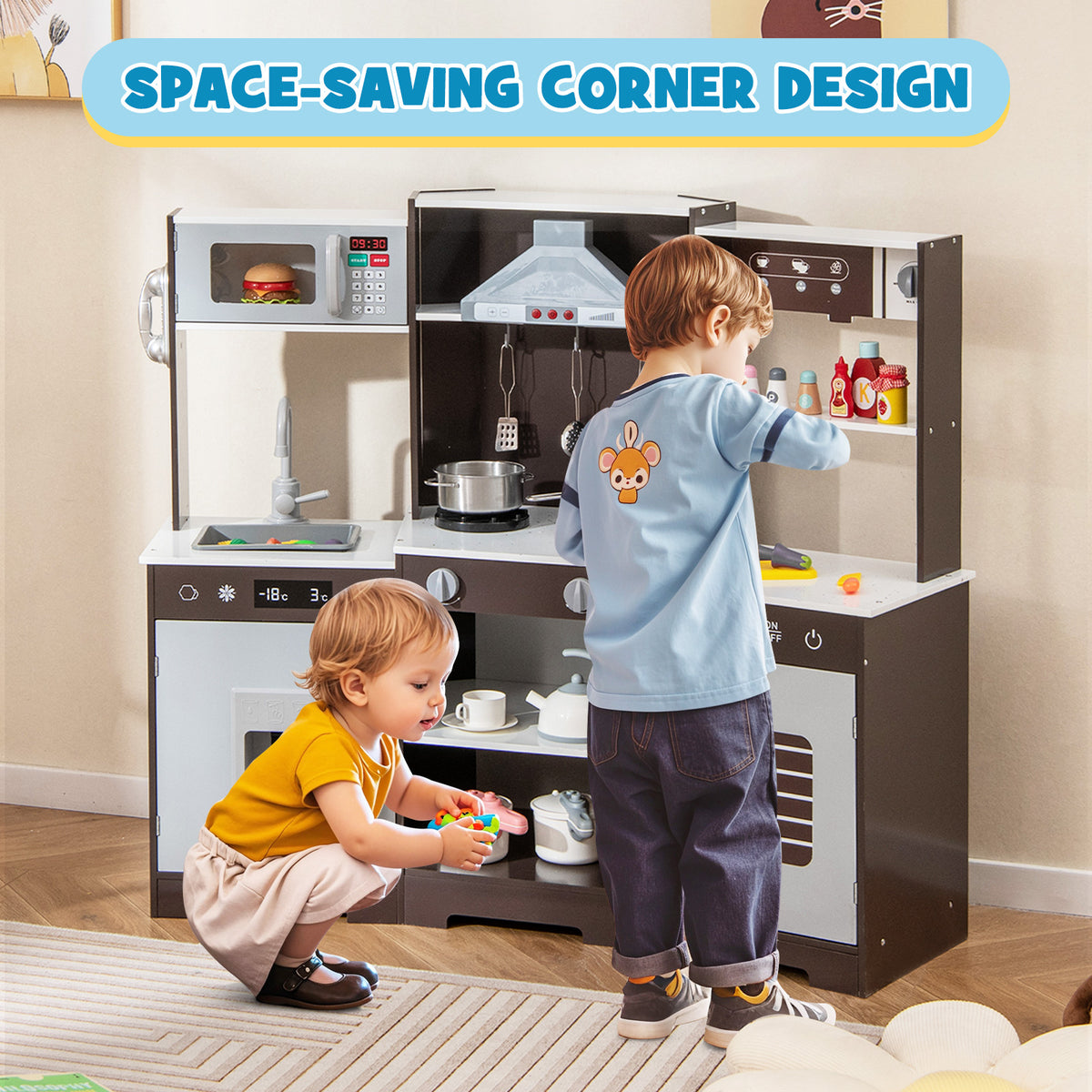 The play kitchen set being used by two young children playing together in a home setting