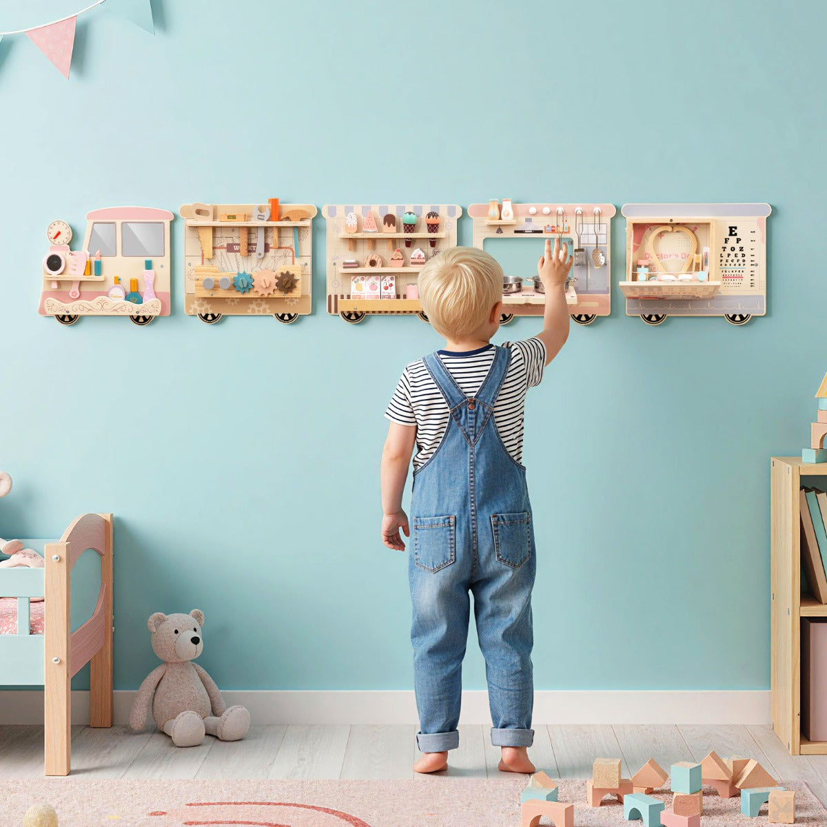 The learning toy is mounted on a light blue wall above a child's bed