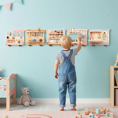 The learning toy is mounted on a light blue wall above a child's bed