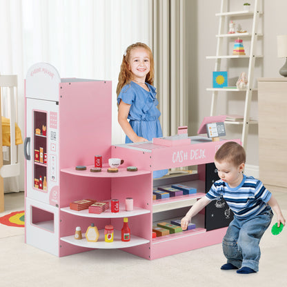 Two children playing with the pink wooden supermarket toy set in a room