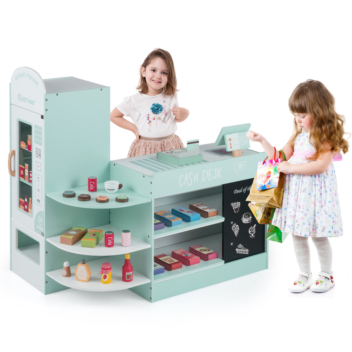 Two children with shopping bags at the green wooden supermarket play kitchen set