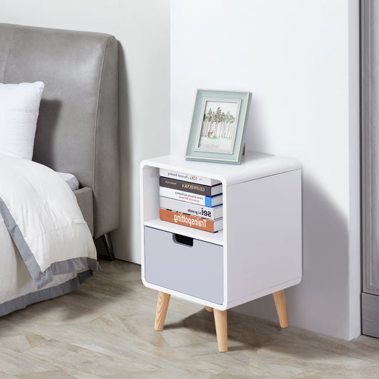 The wooden bedside table next to a bed with books on the shelf