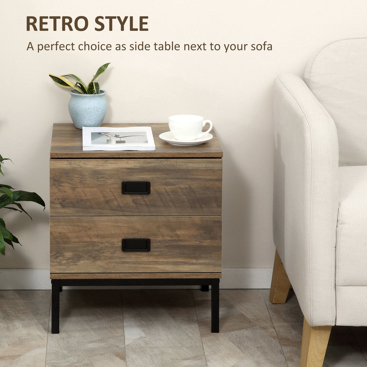 The wooden bedside table beside a sofa with a small plant and a cup on the surface