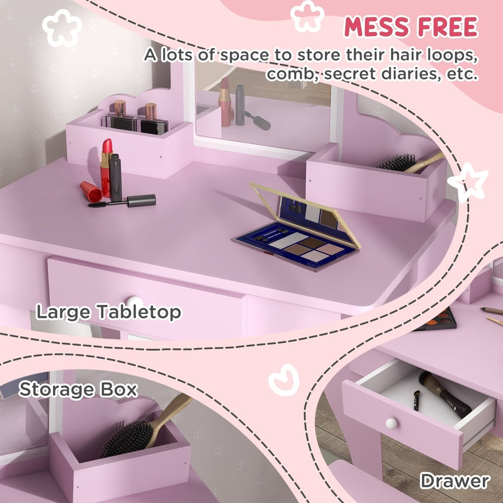 Close up of the pink dressing table showing storage boxes and an open drawer