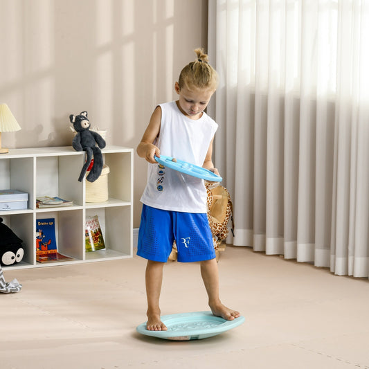 A young boy stands on the blue kids wobble board, balancing indoors